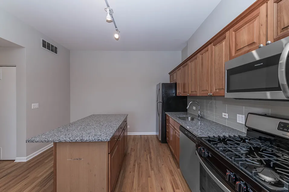 outside red brick of 2010 West Pierce Apartments in Wicker Park Chicago