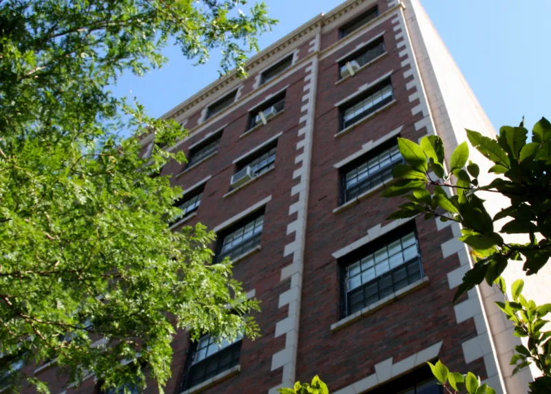 Tree lined street view of 735 West Junior Terrace Apartments in Chicago