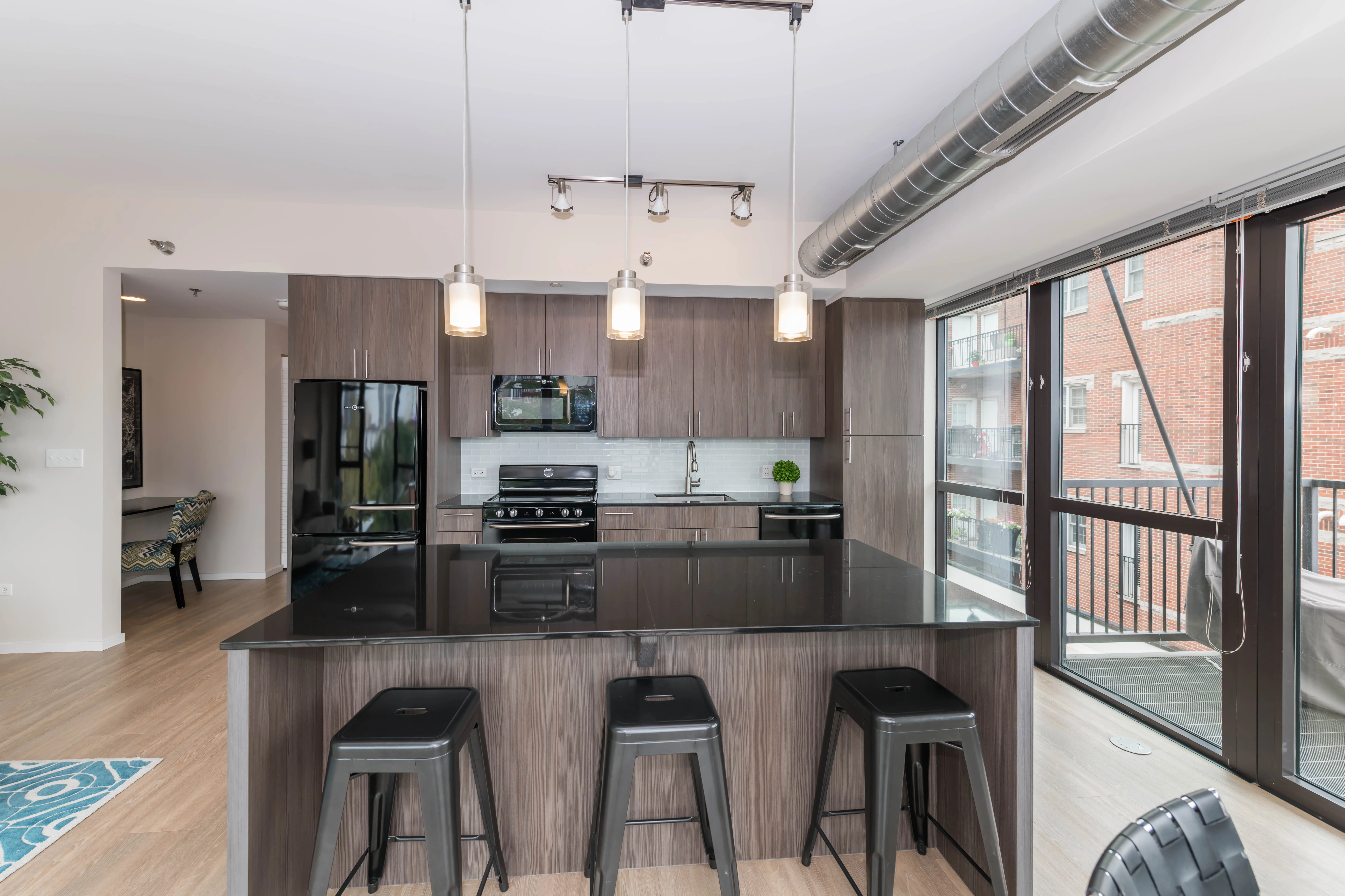 model unit living room at The Scott Residences Apartments in Old Town