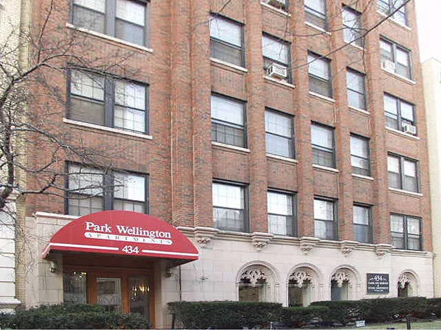 entry lobby and brick facade of the vintage The Park Wellington Apartments