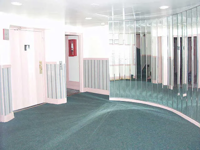 entry lobby and brick facade of the vintage The Park Wellington Apartments