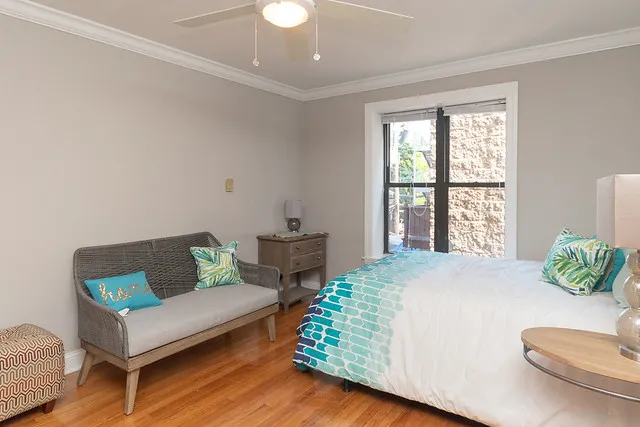 living room and kitchen view at 2244 N. Cleveland Apartments in Chicago