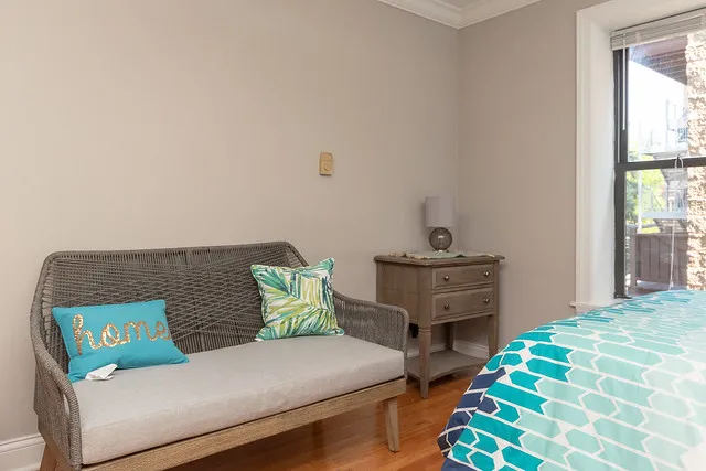 living room and kitchen view at 2244 N. Cleveland Apartments in Chicago