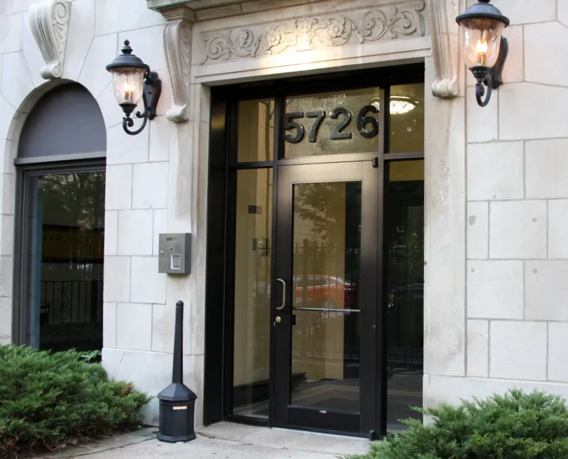 exterior brick and limestone of 5726 North Winthrop Apartments