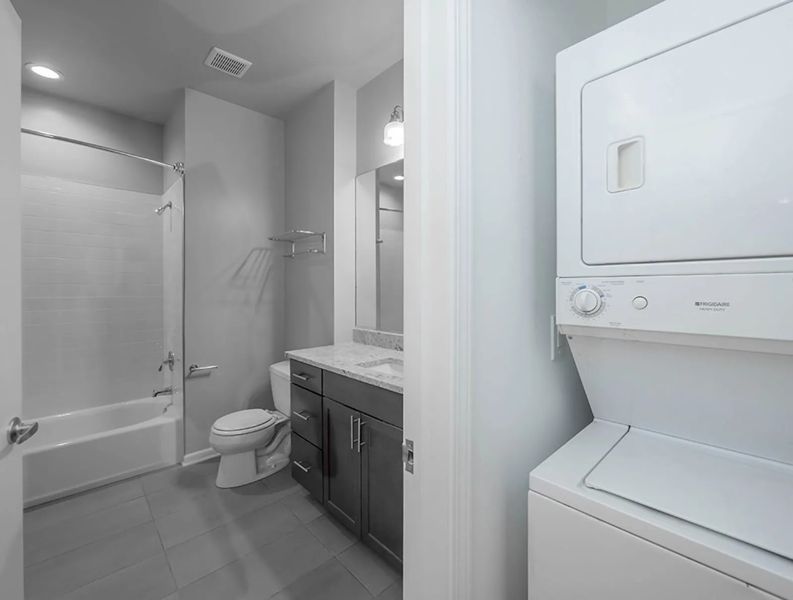giant loft living room with wood floors at 1550 North Damen Lofts
