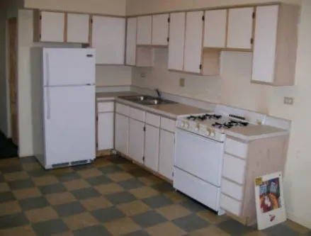 across the street from 4655 S Lake Park Apartments with cars in front