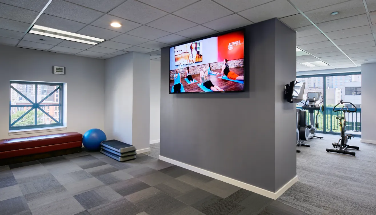 model living room with furnishings at One Superior Place Apartments