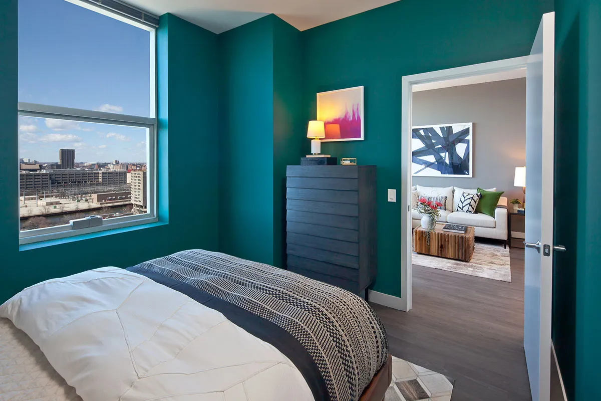 living room and skyline view at 1000 South Clark Apartments