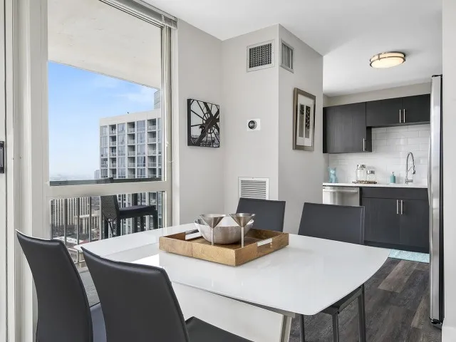 furnished model living room at One East Delaware Apartments