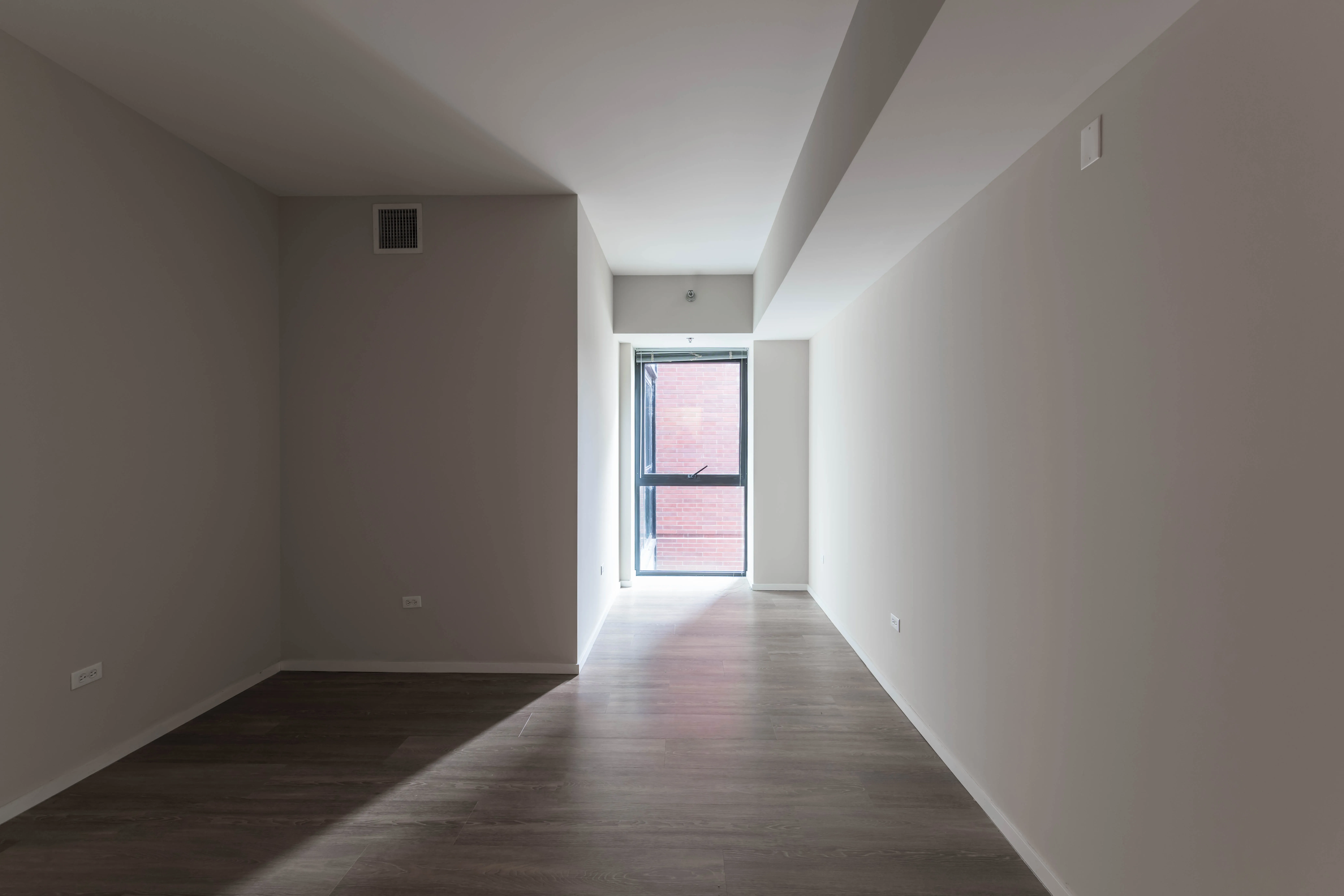 model unit living room at The Scott Residences Apartments in Old Town