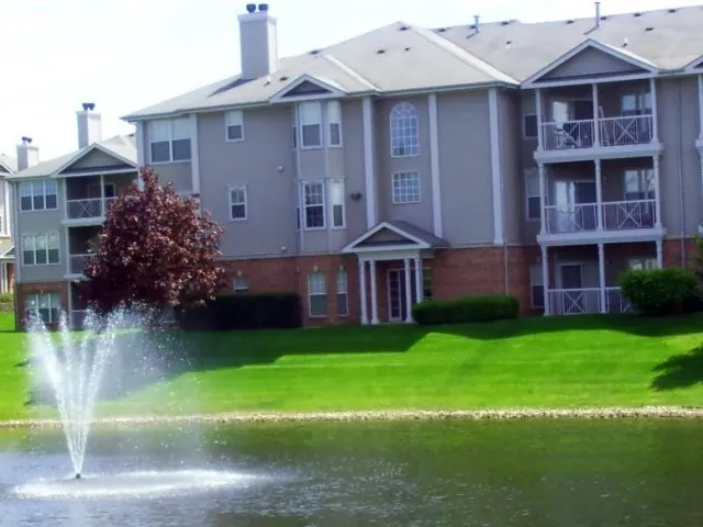 beautiful lake in front of Dwell at Naperville Apartments in Naperville, IL