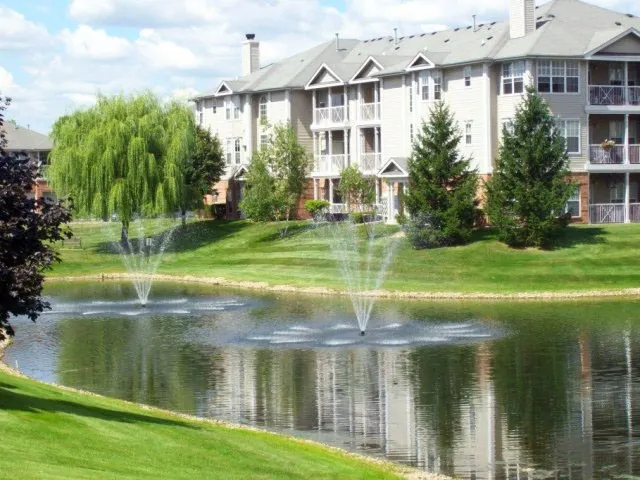 beautiful lake in front of Dwell at Naperville Apartments in Naperville, IL