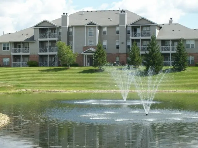 beautiful lake in front of Dwell at Naperville Apartments in Naperville, IL