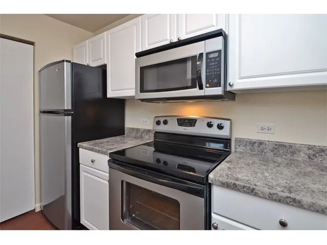 wild flowers in front of the Mark Apartments in Glendale Heights, IL