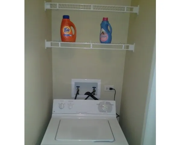 beautiful lake in front of Dwell at Naperville Apartments in Naperville, IL