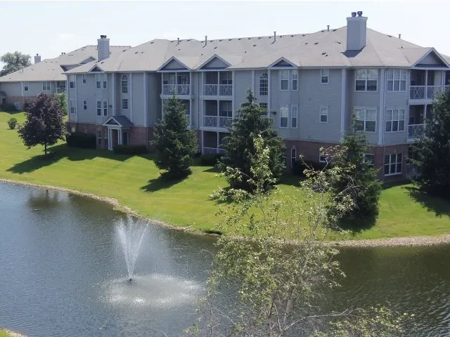beautiful lake in front of Dwell at Naperville Apartments in Naperville, IL