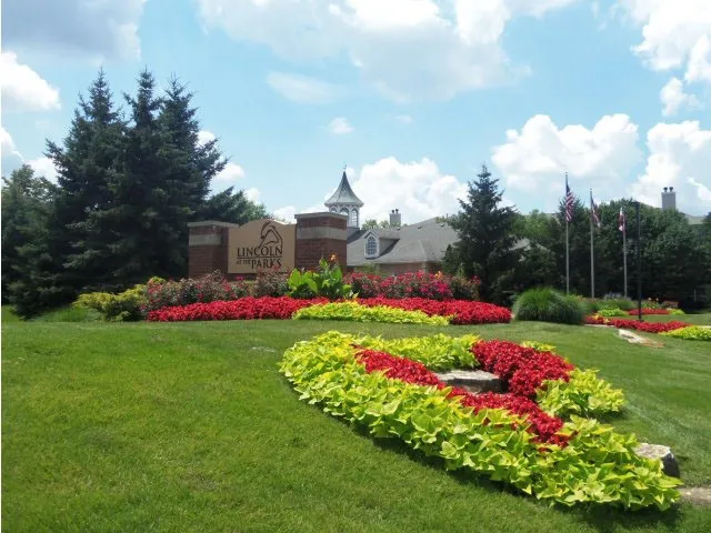 beautiful lake in front of Dwell at Naperville Apartments in Naperville, IL