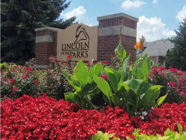beautiful lake in front of Dwell at Naperville Apartments in Naperville, IL