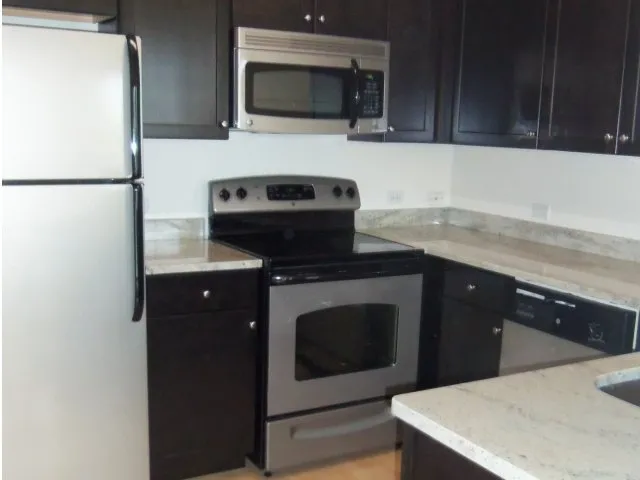 beautiful lake in front of Dwell at Naperville Apartments in Naperville, IL