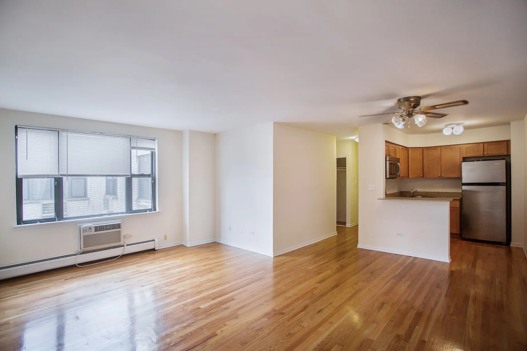 wood floors in living room at Oakdale Terrace Apartments in Chicago