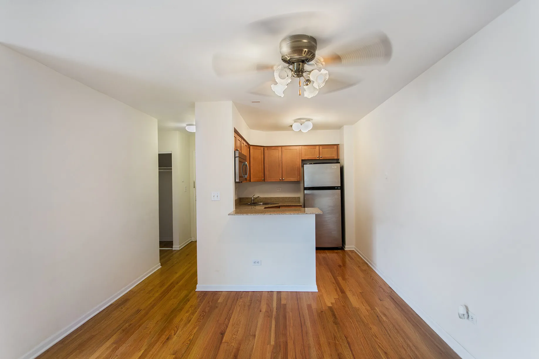 wood floors in living room at Oakdale Terrace Apartments in Chicago