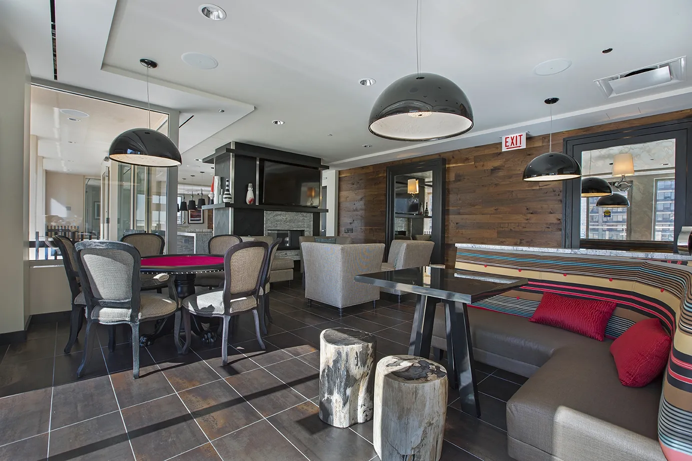 view looking up at The Bernardin Apartments with car traffic