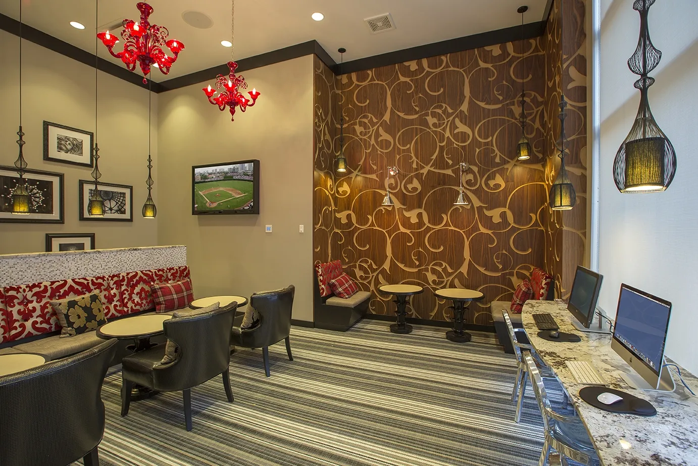 view looking up at The Bernardin Apartments with car traffic