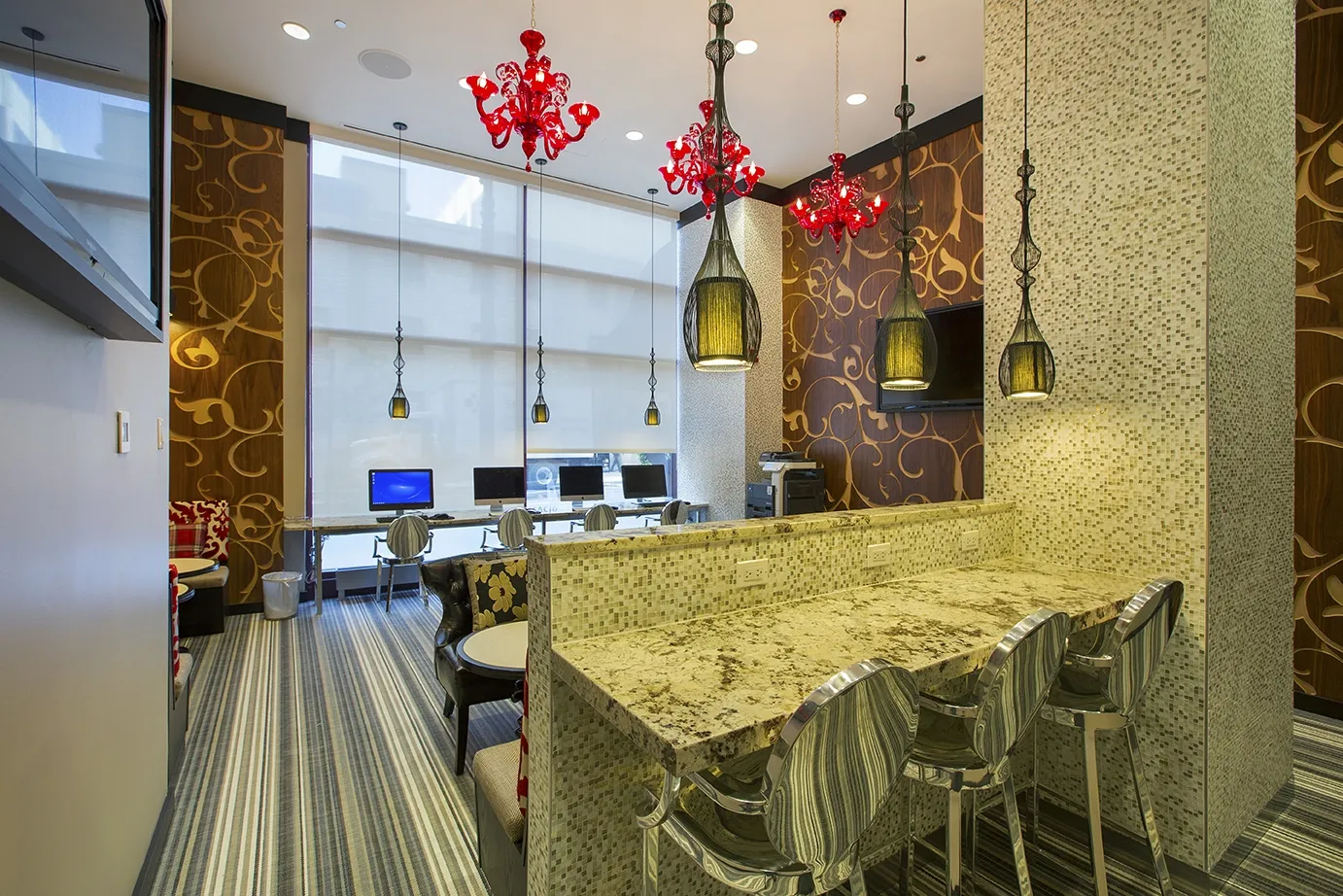 view looking up at The Bernardin Apartments with car traffic