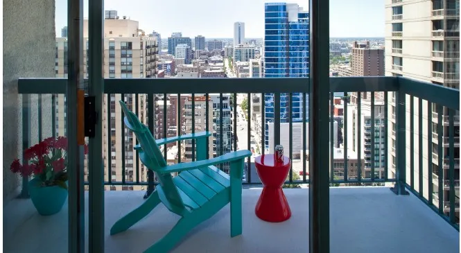 model living room with furnishings at One Superior Place Apartments