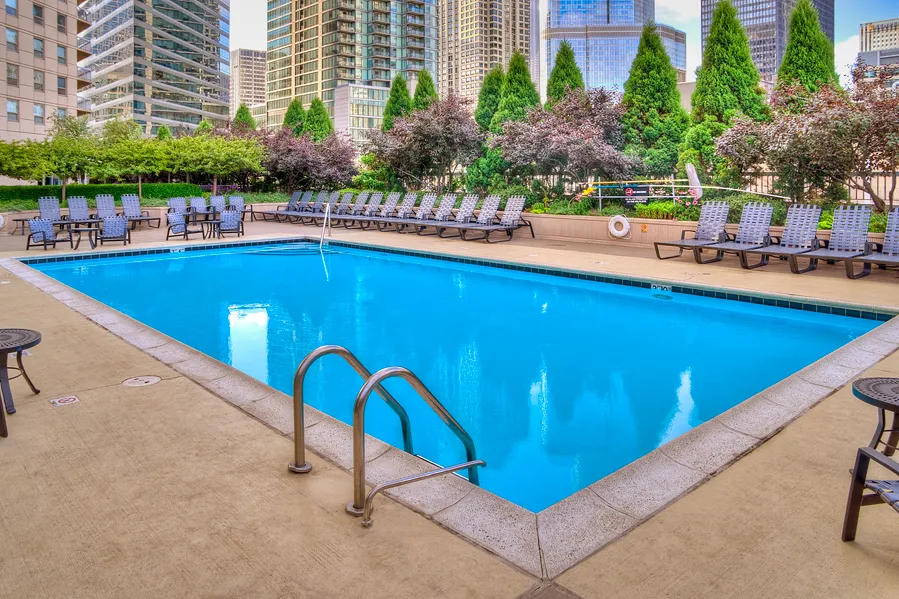 Kitchen with white cabinets at Grand Plaza Apartments in River North