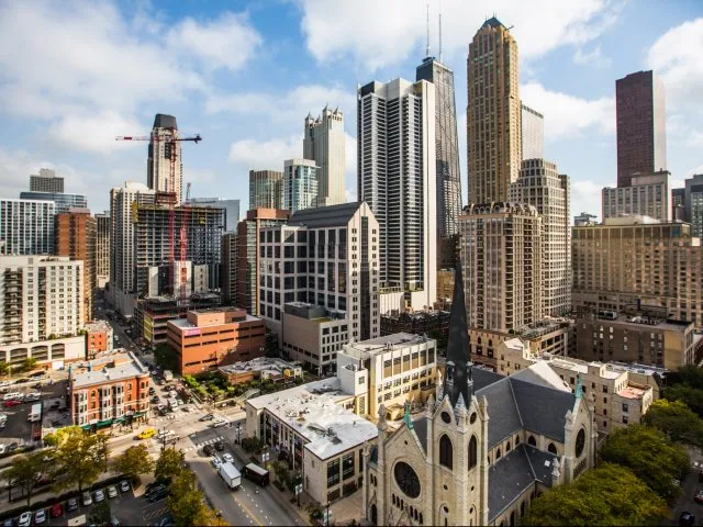 model living room with furnishings at One Superior Place Apartments