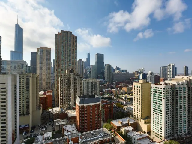 model living room with furnishings at One Superior Place Apartments