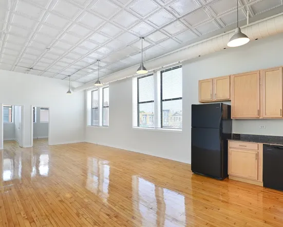 kitchen and living area at 1471 North Milwaukee Apartments  in Wicker Park