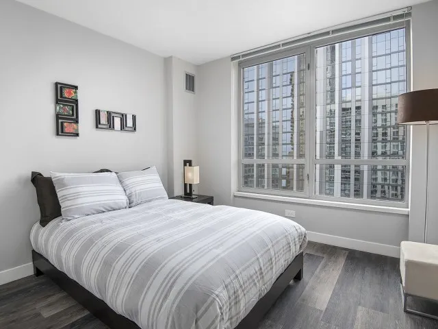 furnished model living room at One East Delaware Apartments