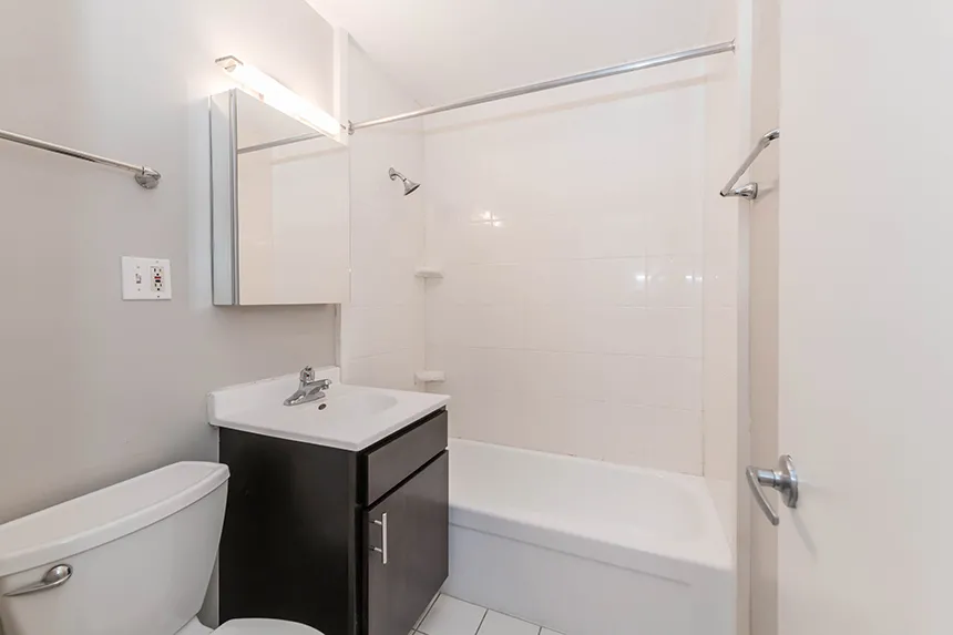 street entrance of Reside on Wellington Apartments in Lakeview Chicago