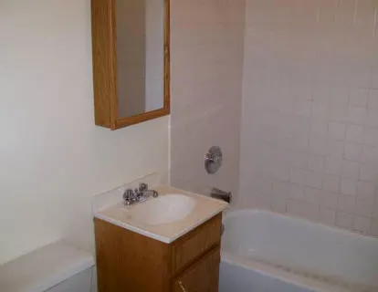 across the street from 4655 S Lake Park Apartments with cars in front