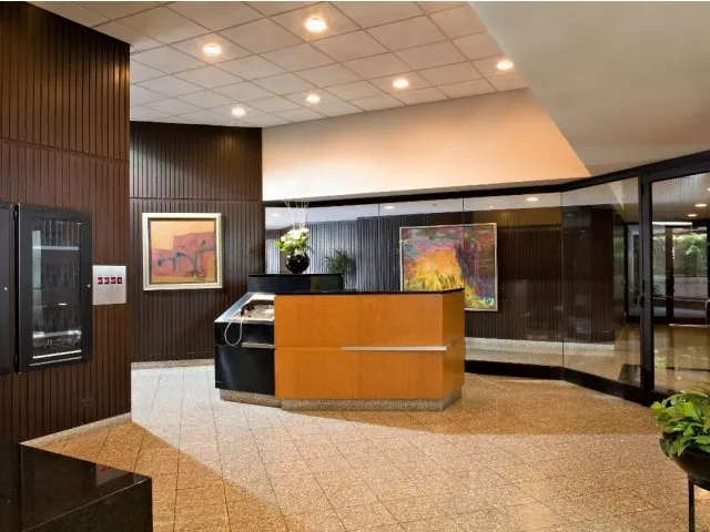 kitchen and breakfast table in model at Asbury Plaza Apartments