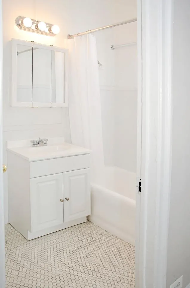 facade of the original historic The Mayfair Apartments in Hyde Park Chicago