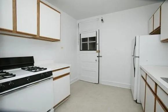 view along side of 4151-57 W Cullom/ 4248-58 N Kevdale aprtments in Chicago