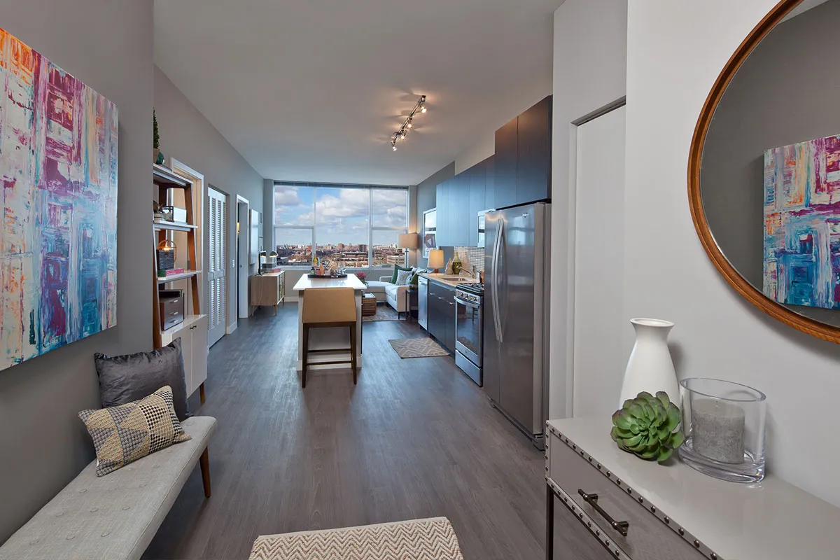 living room and skyline view at 1000 South Clark Apartments
