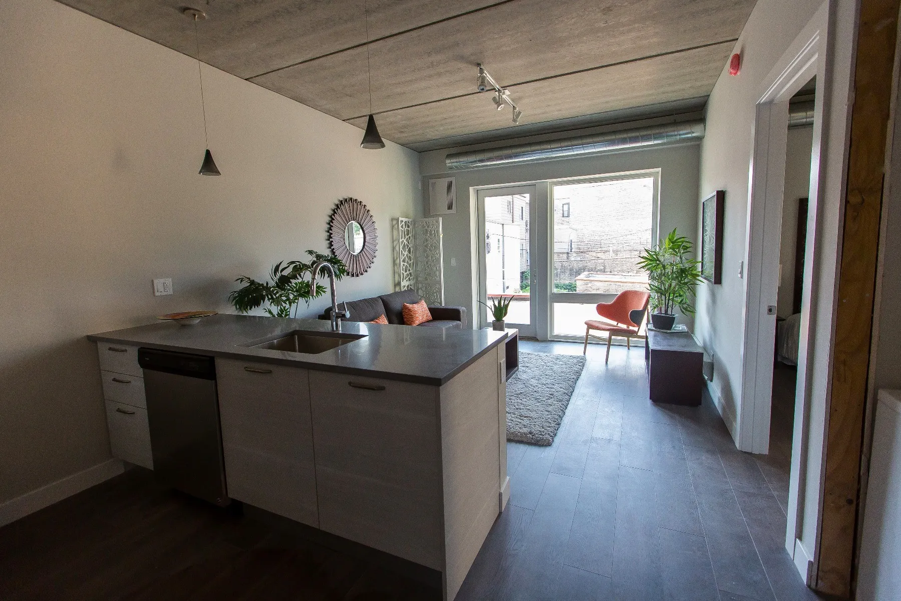 furnished luxury kitchen and living room at The Westerner Apartments