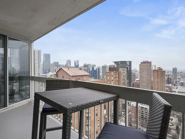 furnished model living room at One East Delaware Apartments