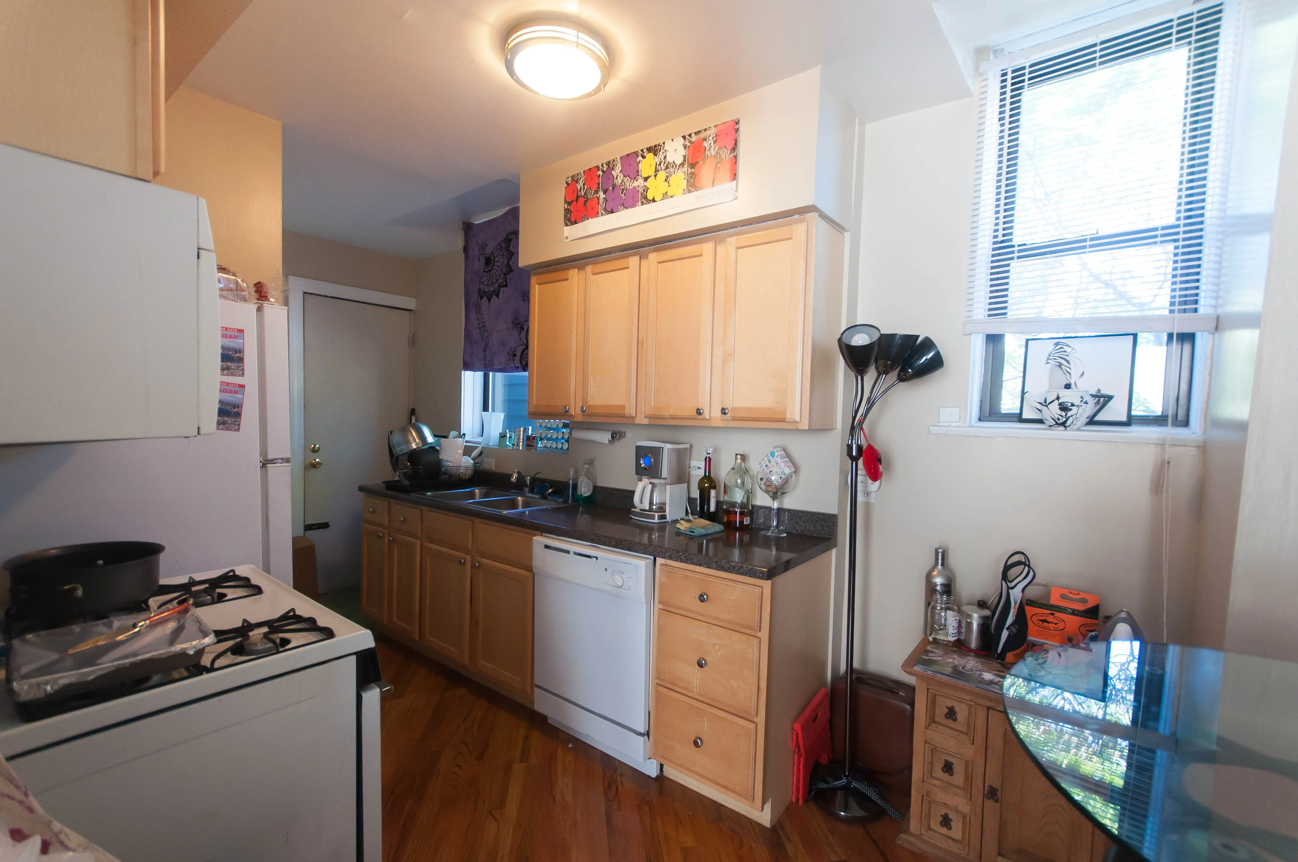 living room with new wood floors at 740 West Oakdale Apartments in Lakeview