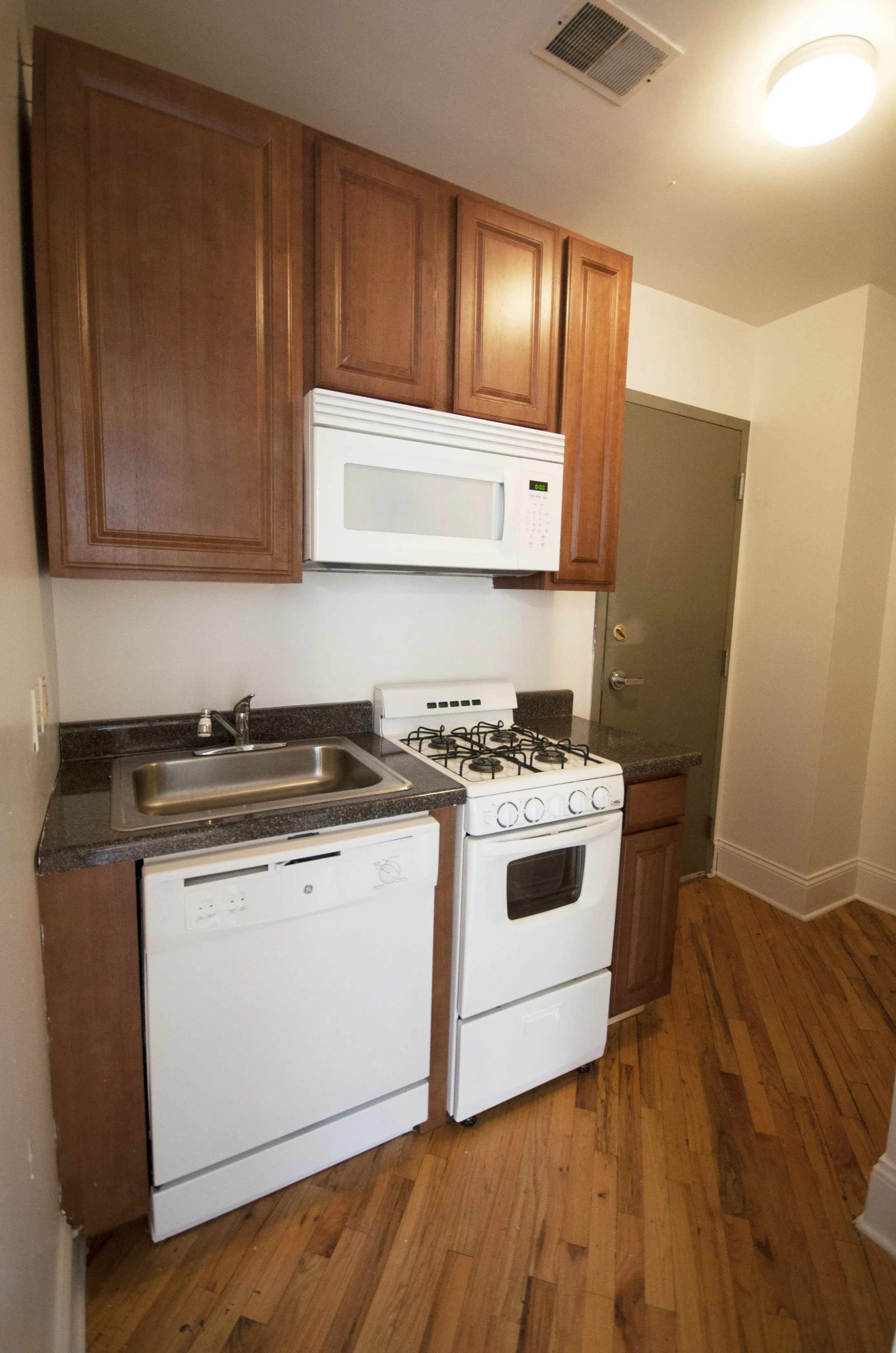 living room with new wood floors at 740 West Oakdale Apartments in Lakeview