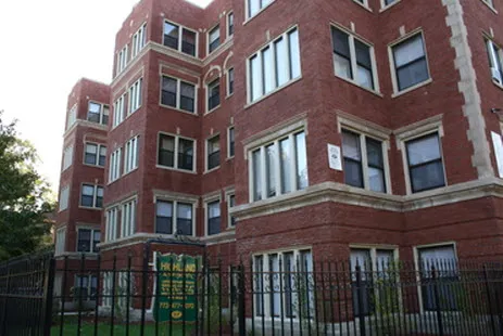 building exterior of Highland Apartments at 7455 North Greenview