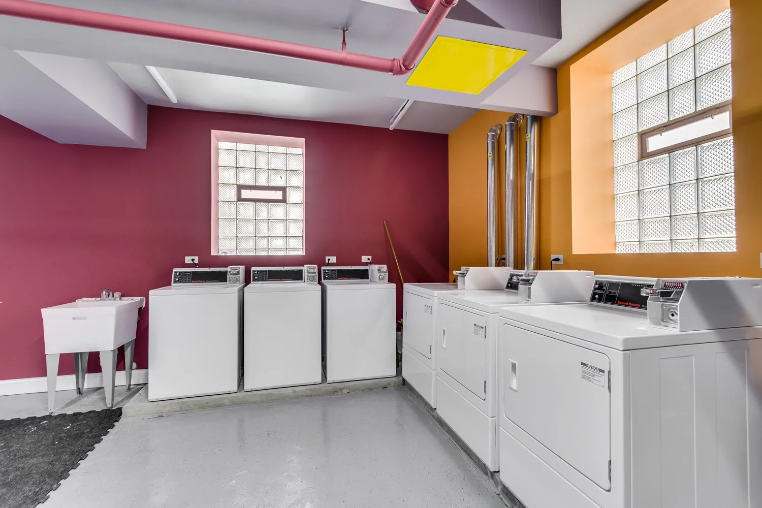 model living room and litchen at 836 East 53rd Apartments