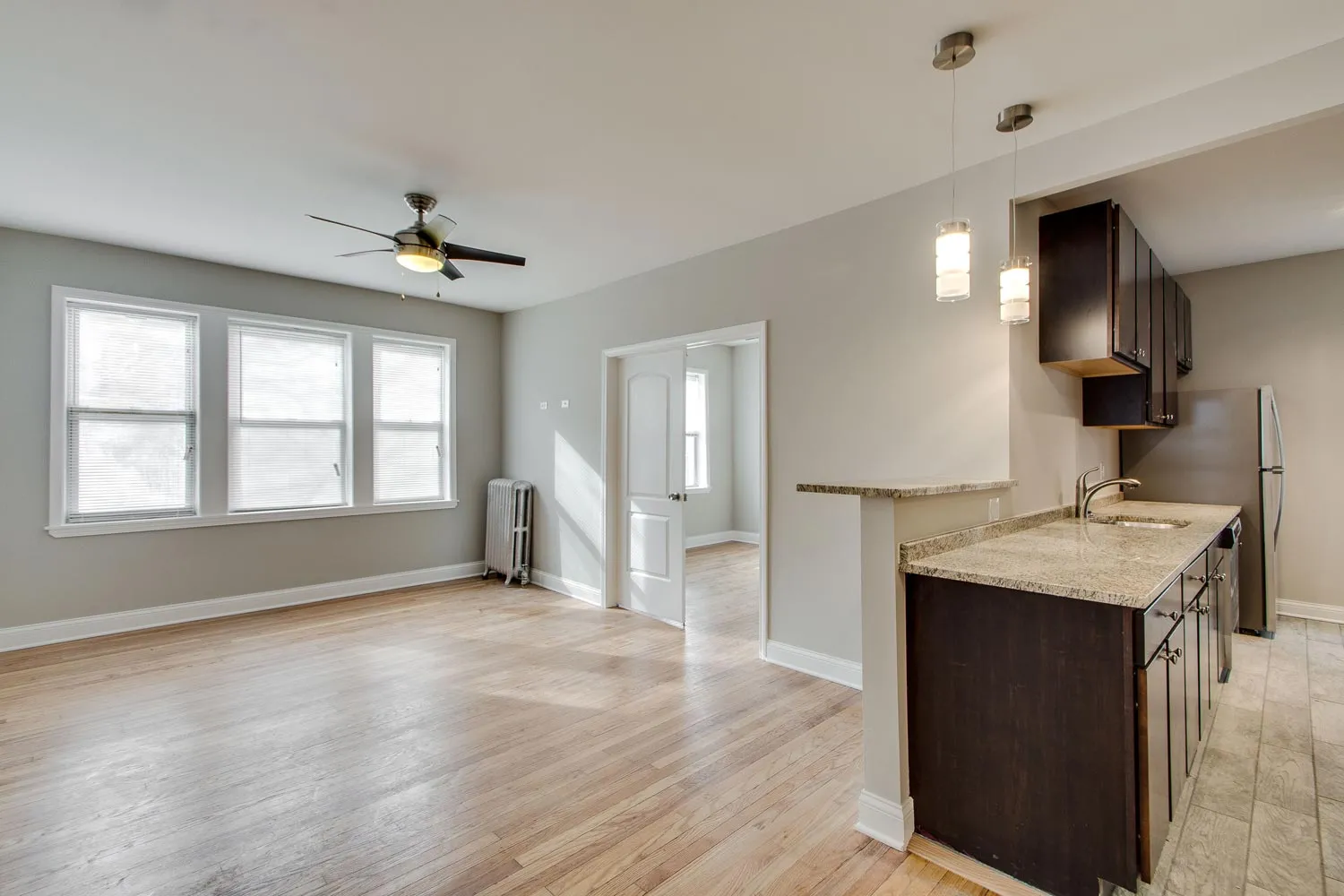 model living room and litchen at 836 East 53rd Apartments