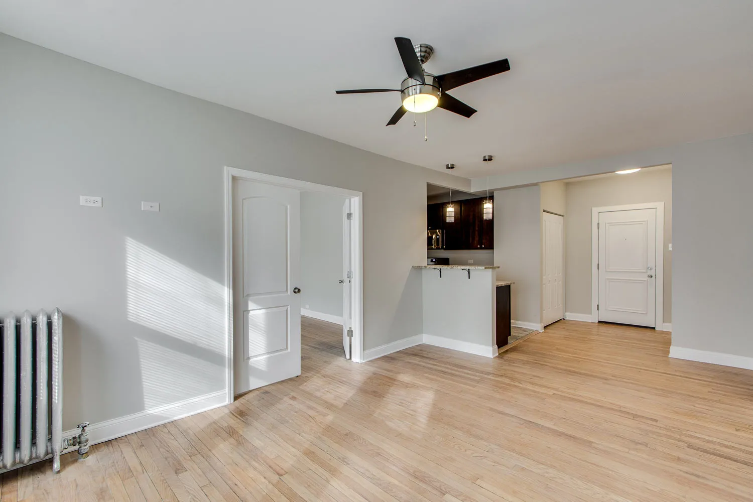 model living room and litchen at 836 East 53rd Apartments