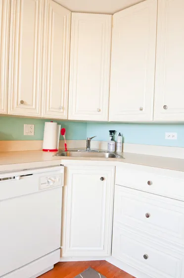 kitchen with white cabinets at 860 Hinman Apartments in Evanston Illinois