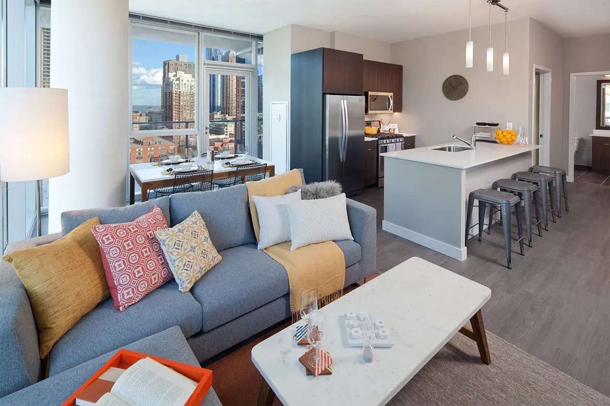 living room and skyline view at 1000 South Clark Apartments
